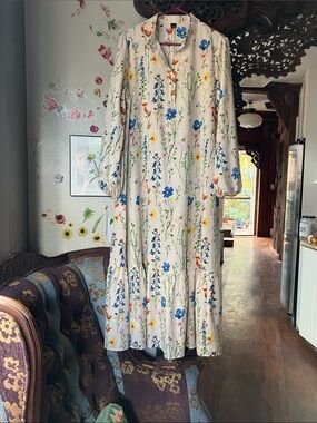 Shein’s Al Najma Women’s Beige Floral Maxi Dress with Blue & Yellow Blooms